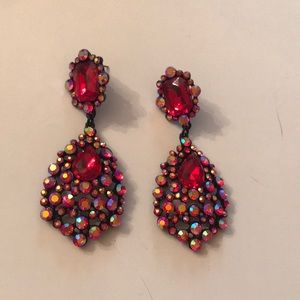 Red pageant earrings set in gunmetal.